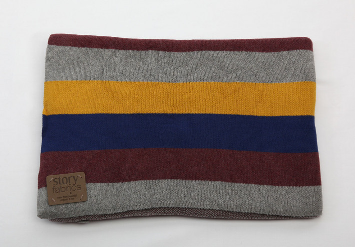 Throw made with fairtrade and organic cotton in blue, lilac, beige and grey