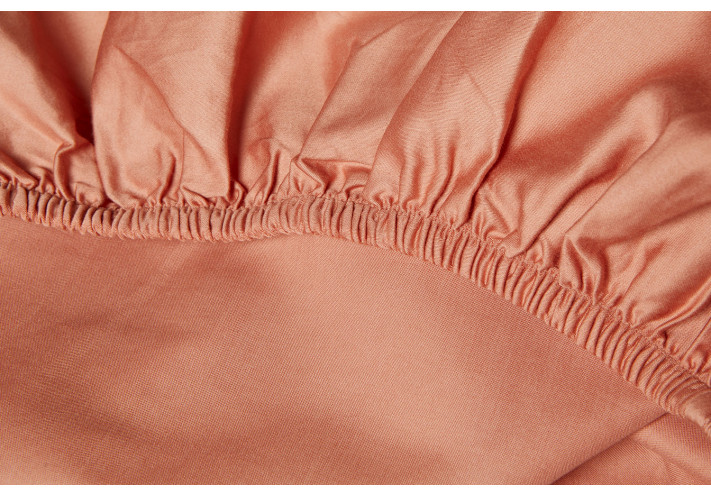 fitted sheet made with cotton. Light corall.
