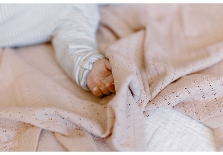 Throw made with fairtrade and organic cotton in blue, lilac, beige and grey