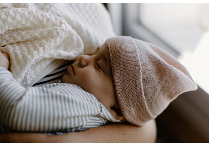 Throw made with fairtrade and organic cotton in blue, lilac, beige and grey