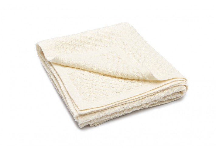 Throw made with fairtrade and organic cotton in blue, lilac, beige and grey